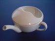Medical (feeding-) cup. Fine china. Silver rim. Two types of graduations on the inside. Ø 10 cm. Victoria (AUT), ca. 1930