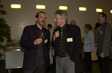 Prof. Markus Solr talking to Dr Maurus Pfister, Prof. Konrad Bloch on the right in the background